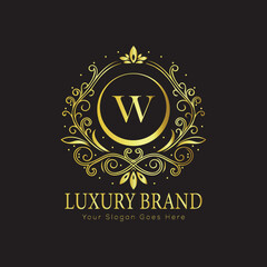 Letter Luxury brand logo design with a royal gold crown emblem and elegant typography

