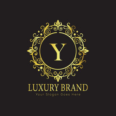 Letter Luxury brand logo design with a royal gold crown emblem and elegant typography
