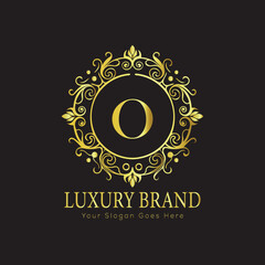 Letter Luxury brand logo design with a royal gold crown emblem and elegant typography
