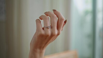 Woman hand engagement ring gesturing closeup. Female fingers with manicure