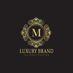 Letter Luxury brand logo design with a royal gold crown emblem and elegant typography
