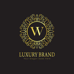 Letter Luxury brand logo design with a royal gold crown emblem and elegant typography
