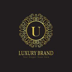 Letter Luxury brand logo design with a royal gold crown emblem and elegant typography
