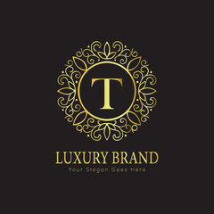 Letter Luxury brand logo design with a royal gold crown emblem and elegant typography
