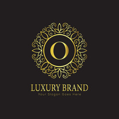 Letter Luxury brand logo design with a royal gold crown emblem and elegant typography
