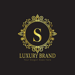 Letter Luxury brand logo design with a royal gold crown emblem and elegant typography
