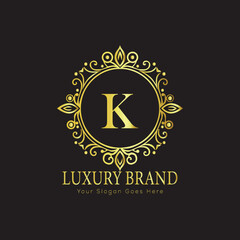Letter Luxury brand logo design with a royal gold crown emblem and elegant typography
