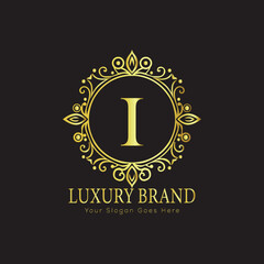 Letter Luxury brand logo design with a royal gold crown emblem and elegant typography

