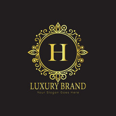Letter Luxury brand logo design with a royal gold crown emblem and elegant typography

