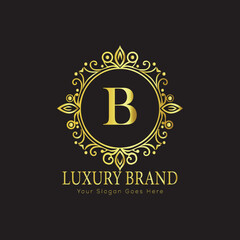 Letter Luxury brand logo design with a royal gold crown emblem and elegant typography
