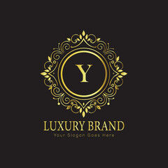 Letter Luxury brand logo design with a royal gold crown emblem and elegant typography
