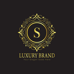 Letter Luxury brand logo design with a royal gold crown emblem and elegant typography
