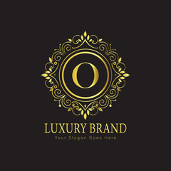 Fototapeta premium Letter Luxury brand logo design with a royal gold crown emblem and elegant typography 