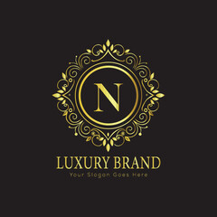 Letter Luxury brand logo design with a royal gold crown emblem and elegant typography
