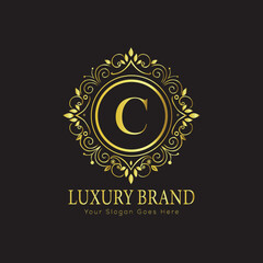 Letter Luxury brand logo design with a royal gold crown emblem and elegant typography
