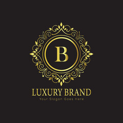 Letter Luxury brand logo design with a royal gold crown emblem and elegant typography
