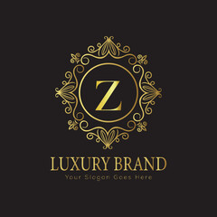 Letter Luxury brand logo design with a royal gold crown emblem and elegant typography

