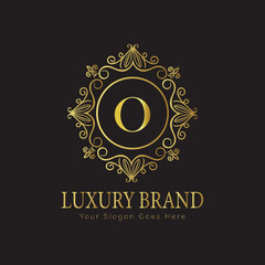 Letter Luxury brand logo design with a royal gold crown emblem and elegant typography
