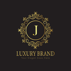 Letter Luxury brand logo design with a royal gold crown emblem and elegant typography
