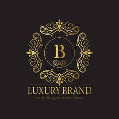 Letter Luxury brand logo design with a royal gold crown emblem and elegant typography

