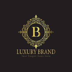 Letter Luxury brand logo design with a royal gold crown emblem and elegant typography
