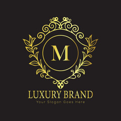 Letter Luxury brand logo design with a royal gold crown emblem and elegant typography
