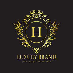 Letter Luxury brand logo design with a royal gold crown emblem and elegant typography
