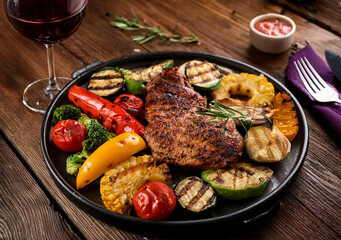 A vibrant flat-lay of a gourmet meal, including colorful vegetables, perfectly grilled meat, and a...