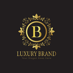Letter luxury gold logo concept brand logo design with a royal gold crown emblem and elegant typography
