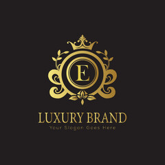 Letter luxury gold logo concept brand logo design with a royal gold crown emblem and elegant typography
