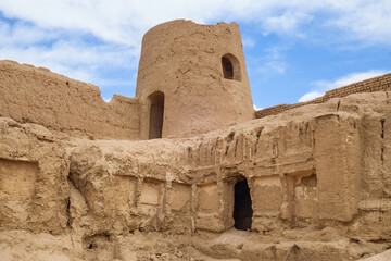 Towers and walls of Sizan Castle in Nushabad, Iran. Castle was built during the Seljuk period. Another name for castle is Kheshti. On tower, you can still see the remains of traditional brick patterns
