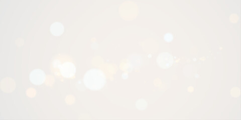A soft and dreamy background featuring delicate white and golden bokeh lights on a light beige canvas, creating an atmosphere of warmth, elegance, and serenity—ideal for minimalist or festive designs. © andreu1990