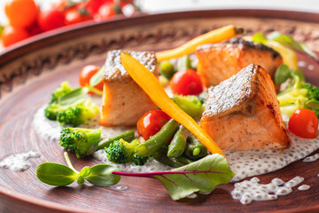 Baked Salmon on Chia Sauce with broccoli, carrots, cherry tomatoes and green beans