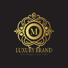 Letter Luxury brand logo design with a royal gold crown emblem and elegant typography
