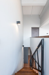 Modern Staircase with Wooden Steps and Minimalist Design. Home Interior