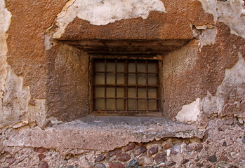 antica finestrella con grata; Cavalese, Trentino