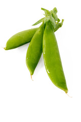Sugar snap peas or snow peas on a white background.