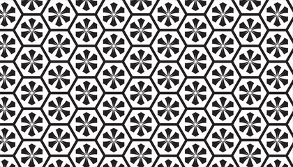 Black flower shaped geometric pattern in seamless hexagon frame. Black and white ornamental design background