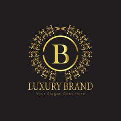 Obraz premium Luxury Ornate Letter Logo with Floral Frame 