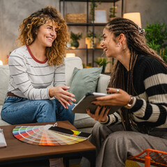 female architect help to her client to choice color for wall