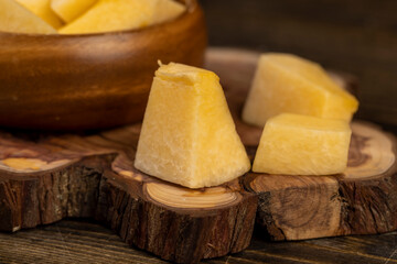 pumpkin pulp in a wooden bowl on the table