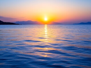 Obraz premium Golden sunset over tranquil ocean waves creating a peaceful and colorful horizon : Generative AI