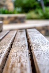 Fototapeta premium Blurred closeup of wooden bench with abstract garden background emphasizing tranquility : Generative AI