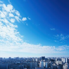 Fototapeta premium Cityscape Under a Vast Blue Sky: A Serene Urban Panorama