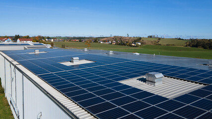 Expansive Solar Panel Arrays on Industrial Facility Roofs