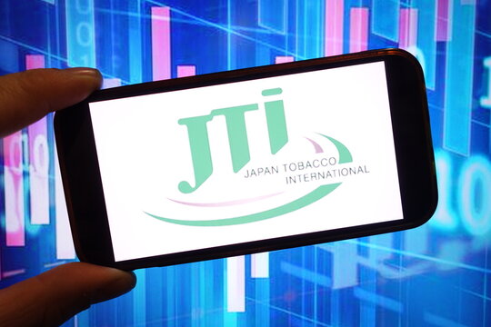 Konskie, Poland - December 07, 2024: Japan Tobacco company logo displayed on mobile phone