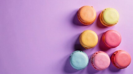 Pastel-colored macarons arranged on a lavender background, a delightful image for culinary blogs or bakery websites showcasing sweet treats and confectionery delights