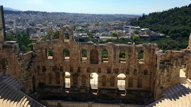 Time Lapse Panning Shot Of Odeon Of Herodes Atticus In Residential City On Sunny Day - Athens, Greece
