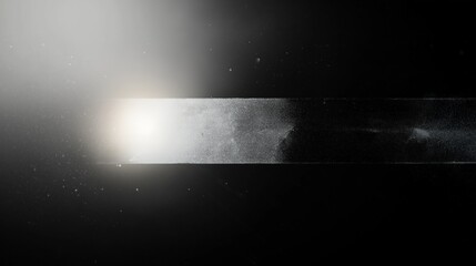 Obraz premium Abstract monochrome illustration with vintage film texture. Grainy black, white background shows dust, scratches. Glowing light leaks create retro grunge style. Ideal for dark-themed designs. Subtle