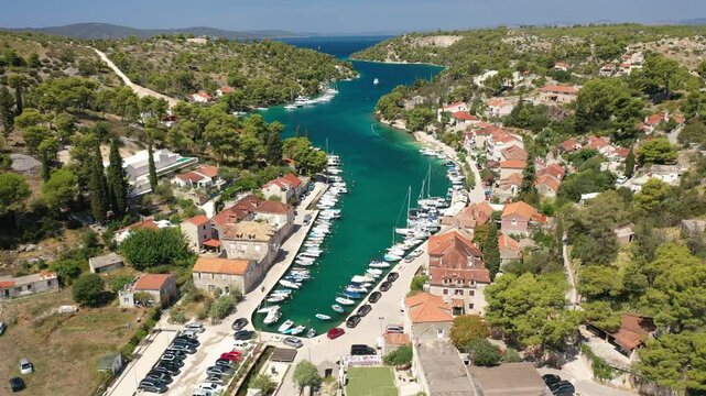 A scenic aerial view of Bobovisca Bay, Croatia, showcasing the entire bay with its crystal-clear waters and surrounding greenery. Bobovisca&rsquo;s natural beauty is perfectly captured from the sky.